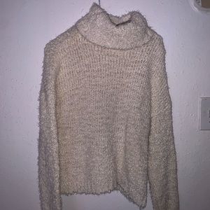 A cream/white chunky sweater